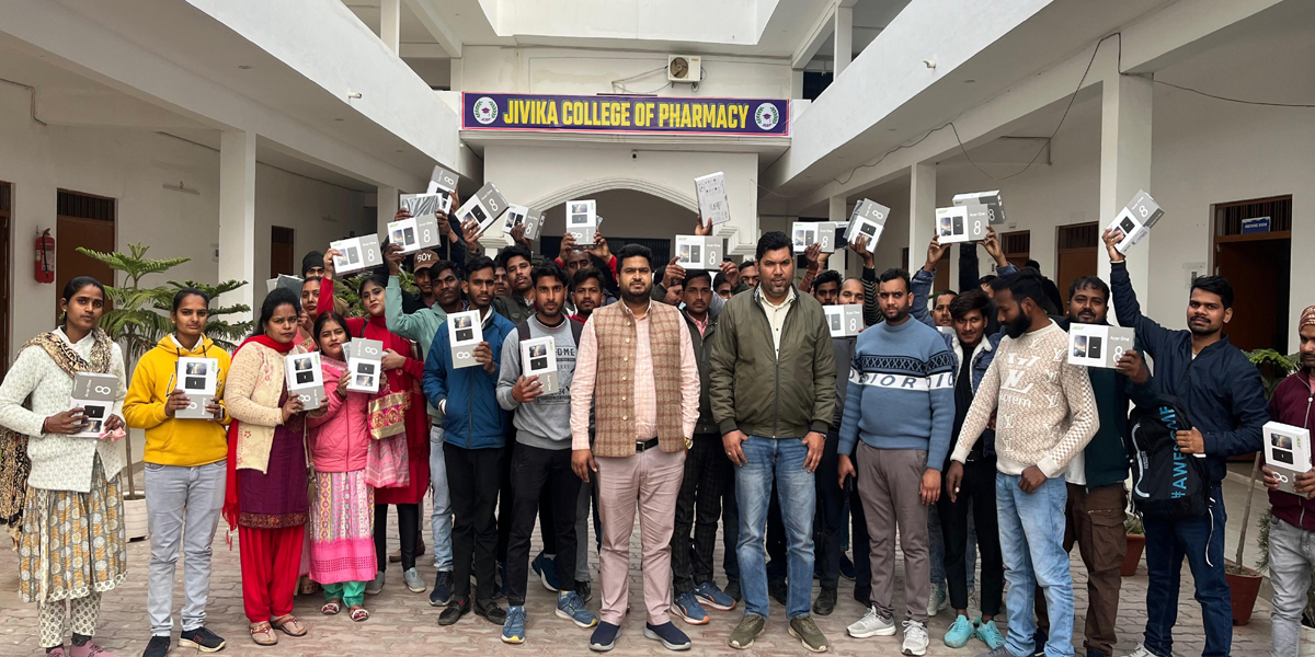 Children get tablets in Jeevika Pharmacy of College