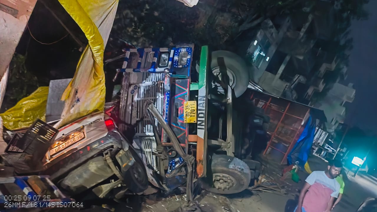 Maruti van crushed under truck