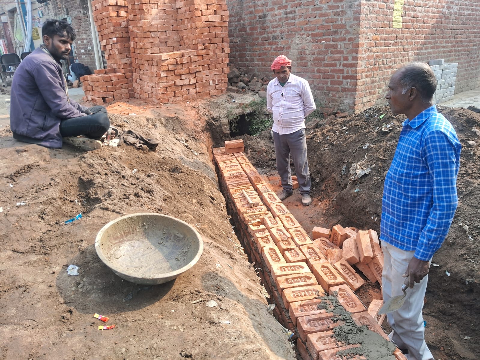 Substandard bricks used in drain construction in Bankeganj were replaced following complaints.