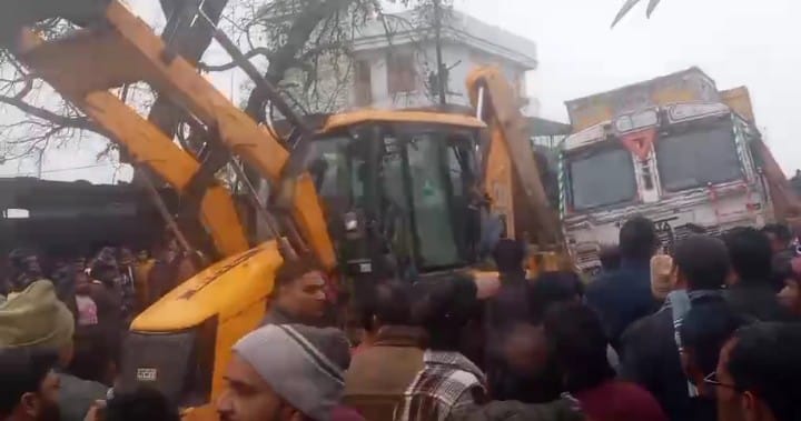 Overloaded truck carrying sugarcane crushes school van, 19 children safe