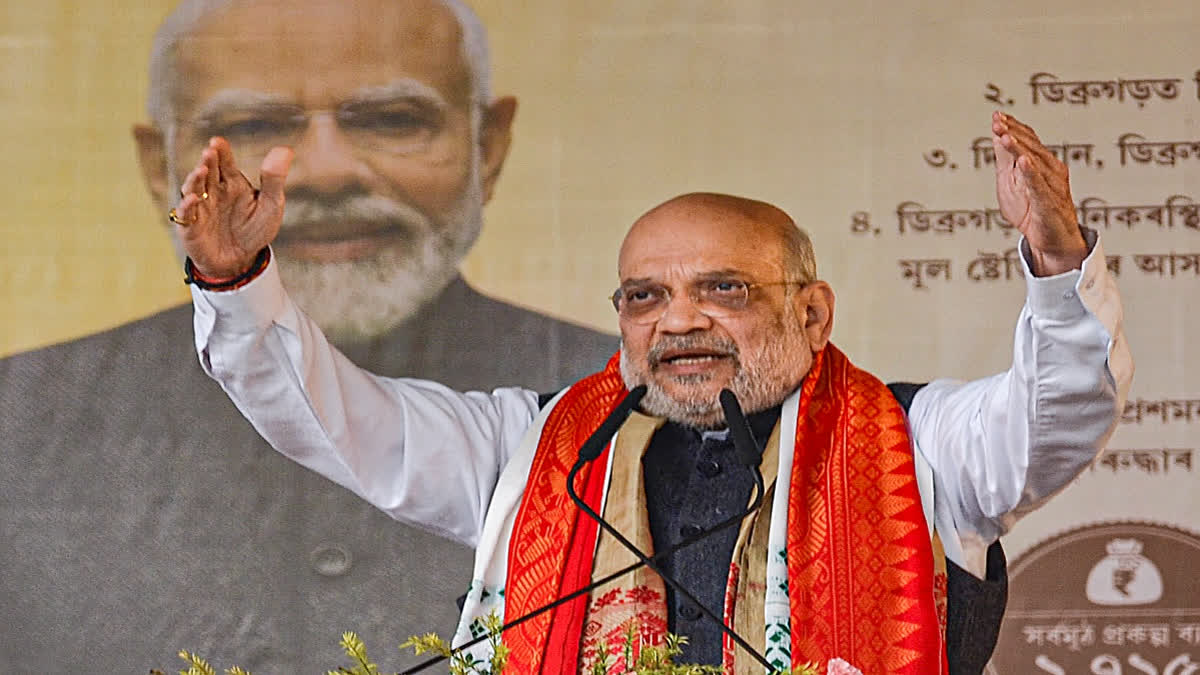 Amit Shah Assam Visit, अमित शाह असम दौरा, Amit Shah Dibrugarh Rally, Assam Politics News, Congress vs BJP Assam, Assam Assembly Election News, Himanta Biswa Sarma, Assam Development Projects, Political News India, North East Politics,Amit Shah Dibrugarh Image, अमित शाह असम रैली फोटो, Assam Development Projects Image, BJP Rally Assam, Home Minister Assam Visit,#AmitShah, #AssamPolitics, #Dibrugarh, #BJP, #Congress, #HimantaBiswaSarma, #AssamDevelopment, #PoliticalNews, #अमित_शाह, #असम_राजनीति,