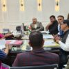 Meeting held regarding displacement of high tension line passing over schools