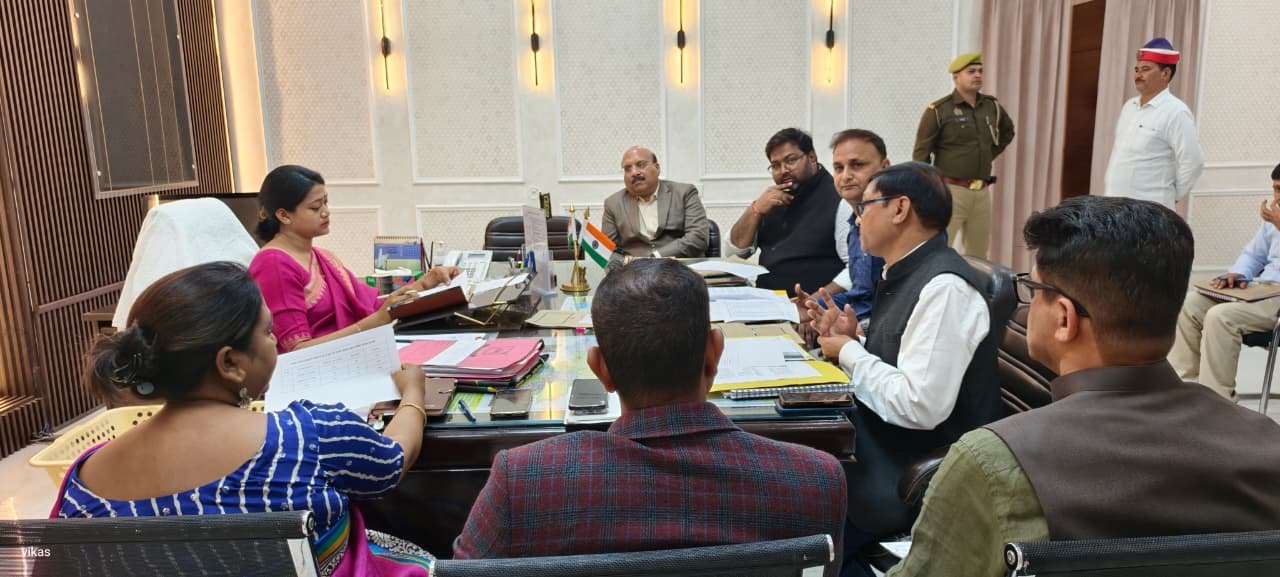 Meeting held regarding displacement of high tension line passing over schools