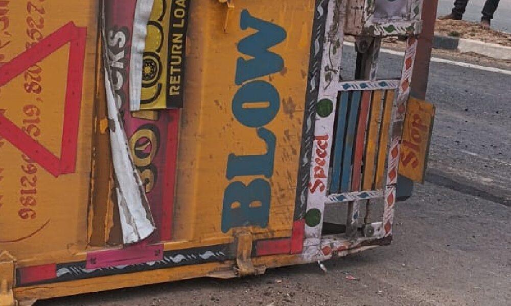 An uncontrolled container overturned near Devmalpur and blocked the National Highway.