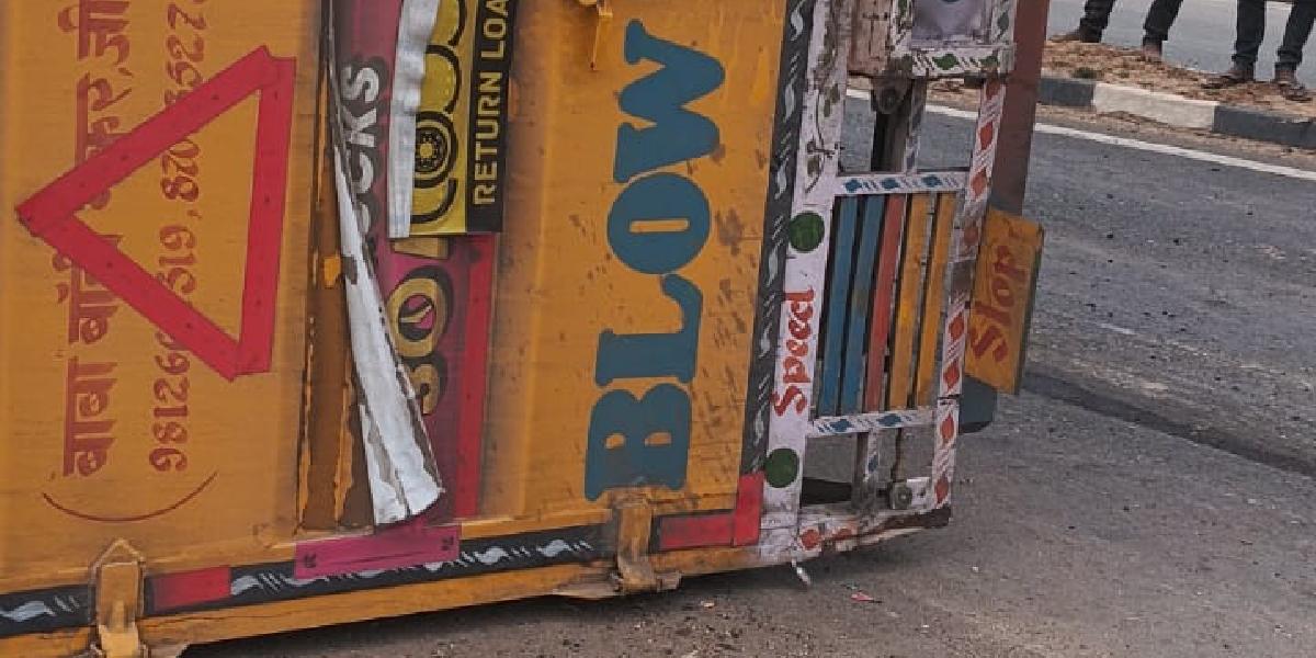 An uncontrolled container overturned near Devmalpur and blocked the National Highway.